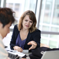 Woman advising another student