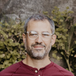 A headshot of Sam McCormick